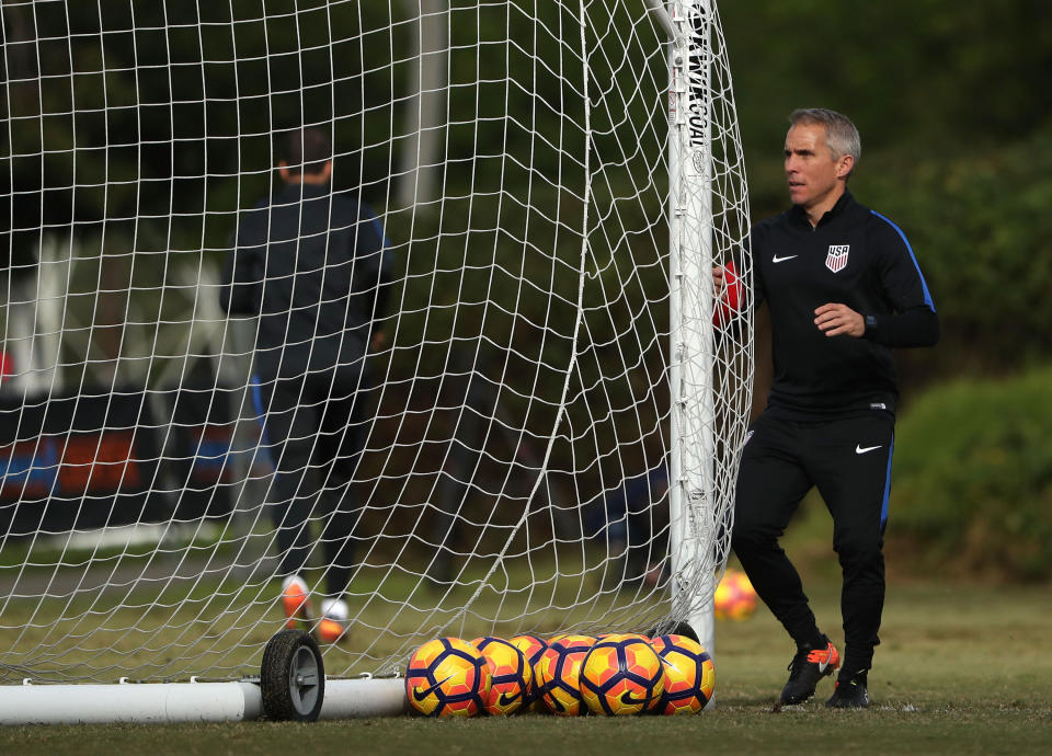 CARSON, CA - JANUARY 19:  Assistant Coach Richie Williams moves the net during the USMNT training session at StubHub Center on January 19, 2017 in Carson, California.  (Photo by Victor Decolongon/Getty Images)