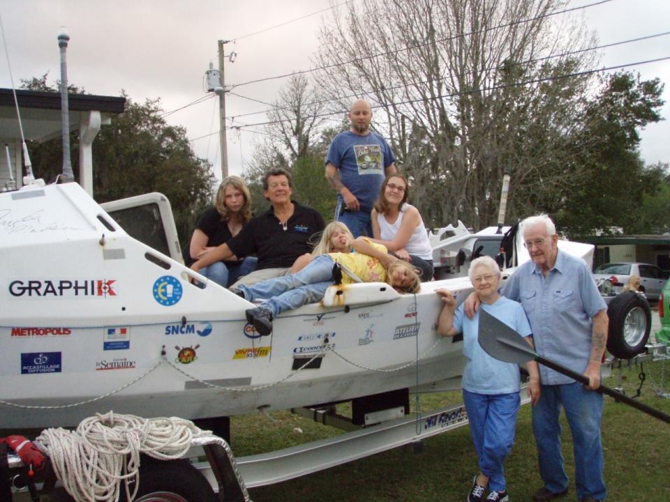 Angela Madsen's boat surrounded by family members.