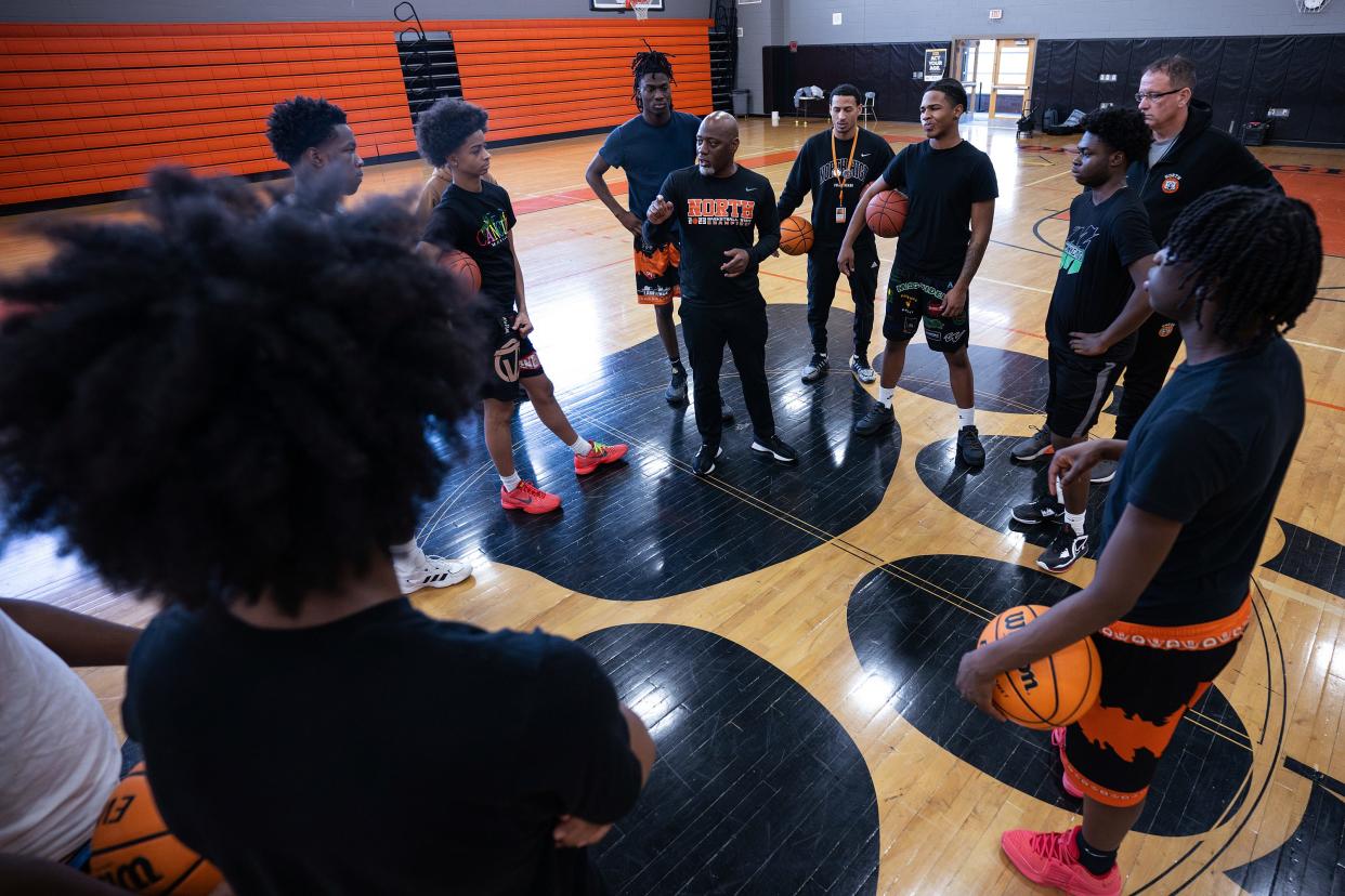 North High boys' basketball coach Al Pettway talks to the team at practice on Tuesday February 27, 2024.