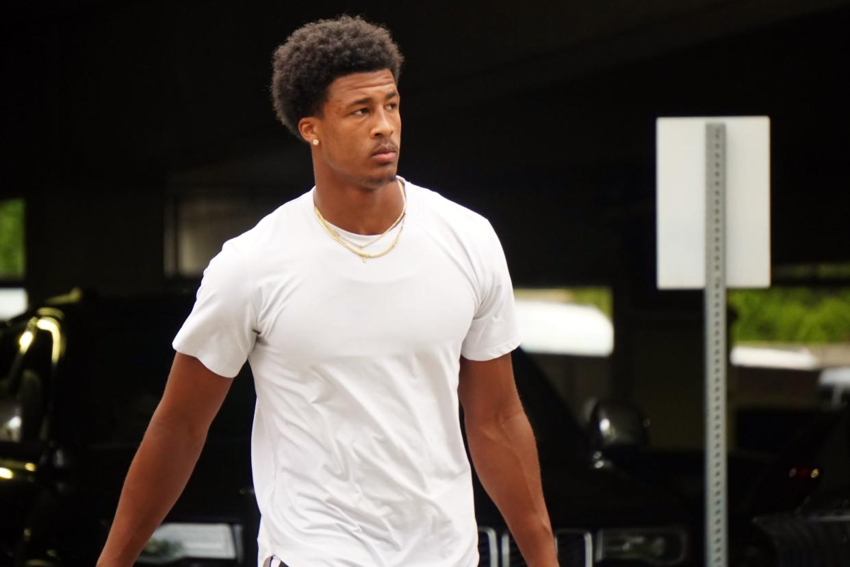 Ohio State football safety Sonny Styles checks into the team's hotel for fall camp in Grandview, Ohio, on Aug. 7, 2023.