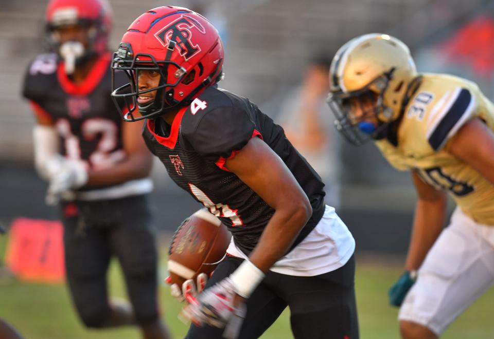 Terry Parker defensive back C.J. Dorsey returns an interception. The two-way senior athlete signed with Ferris State.