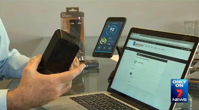 The program operates as a three-part system using a mobile app connected to an ID device via Bluetooth, which is set up through a computer. Photo: 7 News