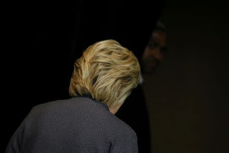 U.S. Democratic presidential candidate Hillary Clinton leaves after speaking at the Black Women's Agenda Annual Symposium in Washington, U.S., September 16, 2016. REUTERS/Carlos Barria