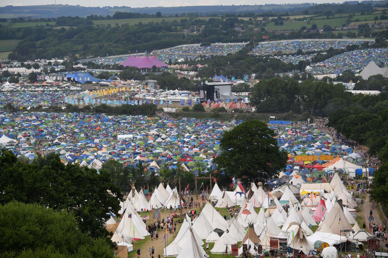 Tents are set up as festivalgoers attend the Glastonbury festival near the village of Pilton in Somerset, southwest England, on June 23, 2022. - More than 200,000 music fans and megastars Paul McCartney, Billie Eilish and Kendrick Lamar descend on the English countryside this week as Glastonbury Festival returns after a three-year hiatus. The coronavirus pandemic forced organisers to cancel the last two years' events, and those going this year face an arduous journey battling three days of major rail strikes across the country. (Photo by ANDY BUCHANAN / AFP) (Photo by ANDY BUCHANAN/AFP via Getty Images)