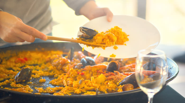 serving simple seafood paella