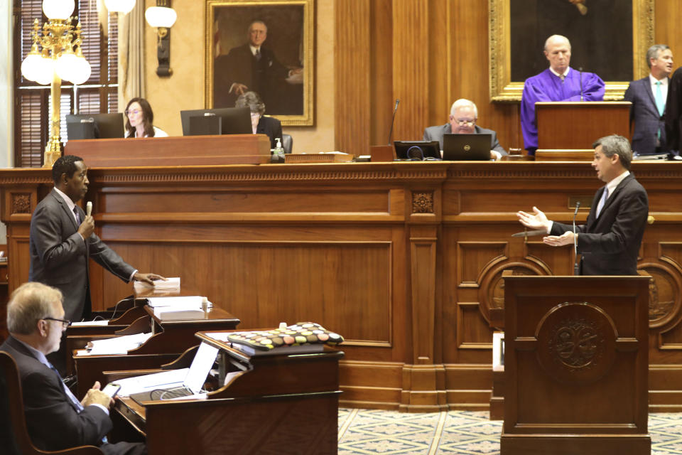 South Carolina Sen. Darrell Jackson, D-Hopkins, left, asks questions about a bill detailing how certain topics are taught and how parents can file complaints in state schools to Senate Majority Leader Shane Massey, R-Edgefield, right, on Tuesday, May 2, 2023, in Columbia, S.C. (AP Photo/Jeffrey Collins)