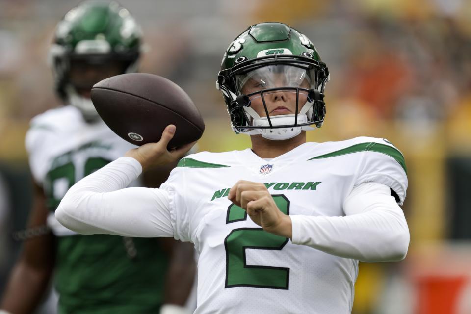 New York Jets' Zach Wilson warms up before a preseason NFL football game against the Green Bay Packers Saturday, Aug. 21, 2021, in Green Bay, Wis. (AP Photo/Matt Ludtke)