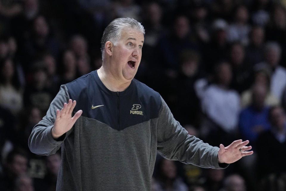 Purdue head coach Matt Painter gestures on the sideline during the second half of an NCAA college basketball game against Maryland in West Lafayette, Ind., Sunday, Jan. 22, 2023. Purdue defeated Maryland 58-55. (AP Photo/Michael Conroy)