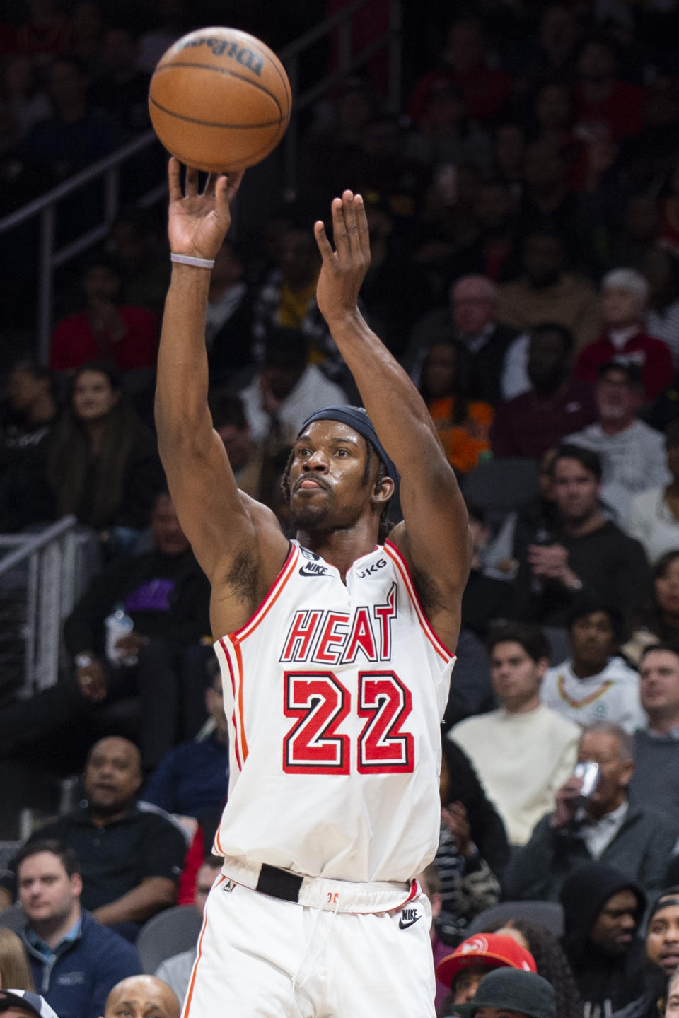 Miami Heat forward Jimmy Butler shoots a 3-point basket during the second half of an NBA basketball game against the Atlanta Hawks, Monday, Jan. 16, 2023, in Atlanta. (AP Photo/Hakim Wright Sr.)