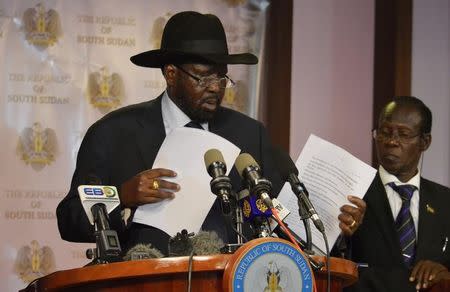 South Sudan President Salva Kiir (L) flanked by Second Vice President James Wani Igga address a news conference at the Presidential State House following renewed fighting in South Sudan's capital Juba, July 8, 2016. REUTERS/Stringer