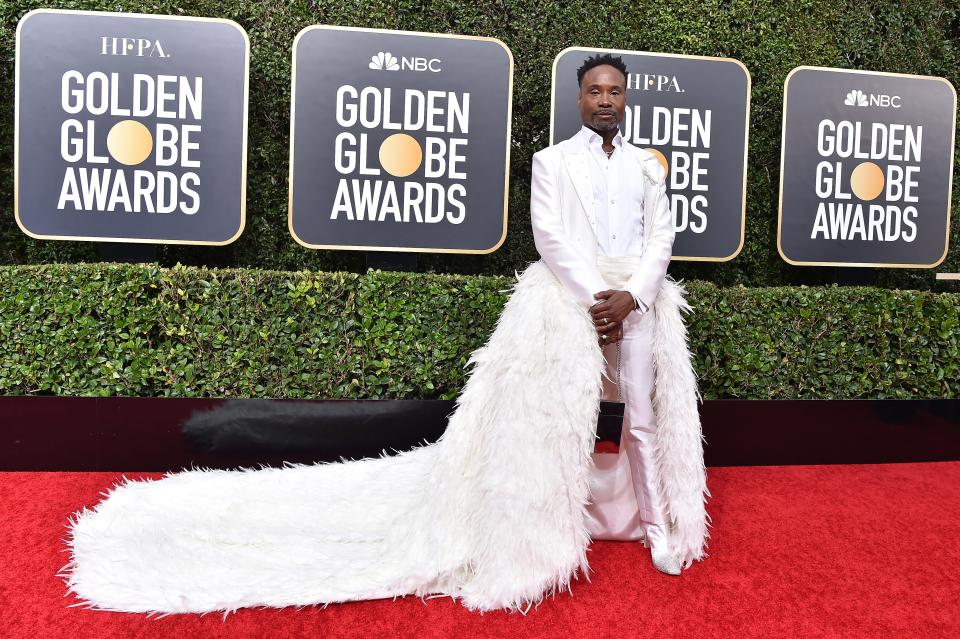 Billy Porter at the 2020 Golden Globes wearing white suit with white train