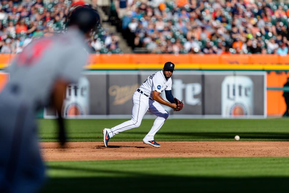 Detroit Tigers third baseman Jeimer Candelario (46) fields a ground ball from Minnesota Twins third baseman Gio Urshela (15) during the second inning at Comerica Park.