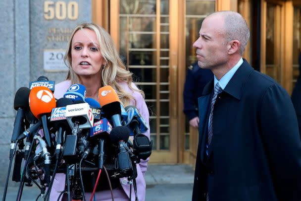 PHOTO: Stormy Daniels, accompanied by her attorney, Michael Avenatti, talks to the media as she leaves federal court, April 16, 2018, in New York.  (Mary Altaffer/AP, FILE)