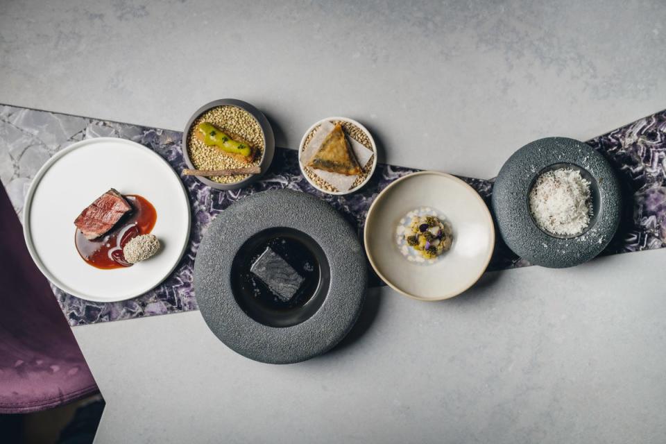 Amethyst dishes including ras el hanout beef and the coal-like black cod (Amethyst/@lateef.photography)