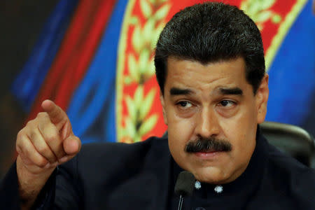 FILE PHOTO: Venezuela's President Nicolas Maduro gestures while he talks to the media during a news conference at Miraflores Palace in Caracas, Venezuela October 17, 2017. REUTERS/Carlos Garcia Rawlins/File Photo