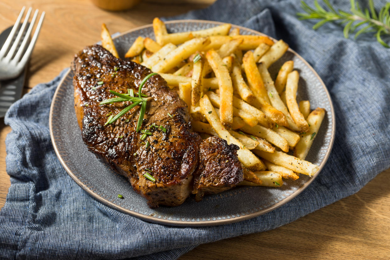 Homemade Rosemary Steak and French Fries with Salt as part of a three-course meal