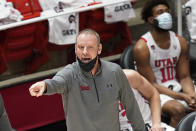 Utah coach Larry Krystkowiak shouts to the team during the first half of an NCAA college basketball game against UCLA on Thursday, Feb. 25, 2021, in Salt Lake City. (AP Photo/Rick Bowmer)