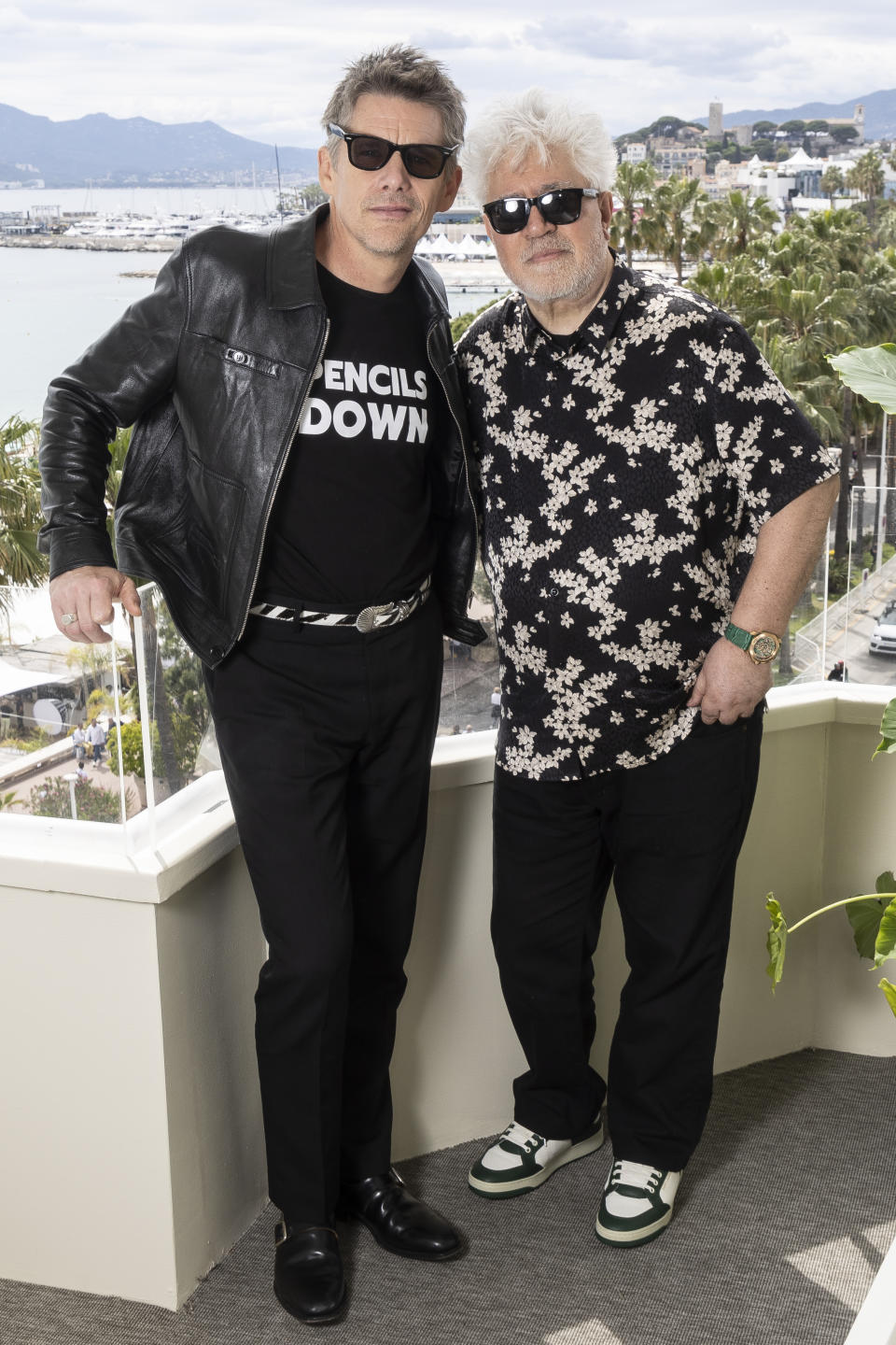 Ethan Hawke, left, and director Pedro Almodovar pose for portrait photographs for the film 'Strange Way of Life' at the 76th international film festival, Cannes, southern France, Thursday, May 18, 2023. (Photo by Joel C Ryan/Invision/AP)