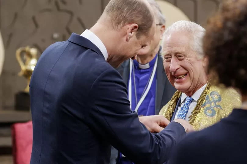 The rehearsal for the coronation will be aired in Charles III: The Coronation Year, which shows Prince William using his hands to close a small clasp holding a lavish robe around his father