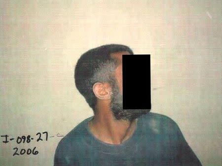 A black strip placed by censors masks the identity of a detainee in an undated photo from Iraq's Abu Ghraib prison, among 198 images released in a Freedom of Information Act (FOIA) lawsuit against the U.S. Department of Defense in Washington, DC February 5, 2016. REUTERS/DoD/Handout via Reuters