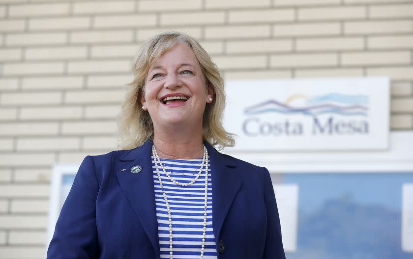 Mayor Katrina Foley in front of Costa Mesa City Hall. Foley walked away with a second term and 53% of the vote on Tuesday.