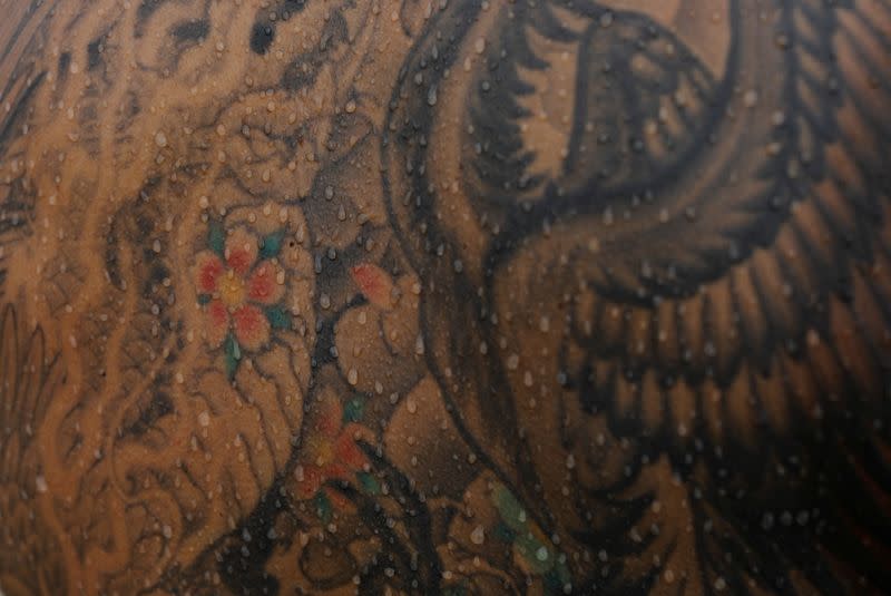 The Wider Image: Breaking taboos: Japan's tattoo fans bare their ink