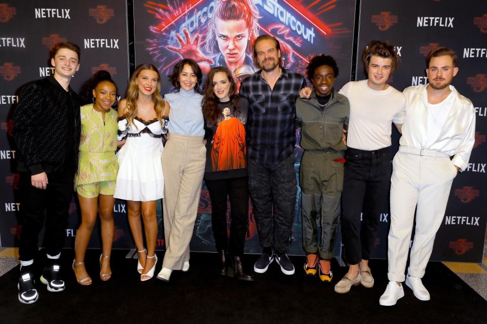 HOLLYWOOD, CALIFORNIA - NOVEMBER 09: (L-R) Noah Schnapp, Priah Ferguson, Millie Bobby Brown, Carmen Cuba, Winona Ryder, David Harbour, Caleb McLaughlin, Joe Keery, and Dacre Montgomery attend a photocall for Netflix's "Stranger Things" Season 3 at Linwood Dunn Theater at the Pickford Center for Motion Study on November 09, 2019 in Hollywood, California. (Photo by JC Olivera/Getty Images)