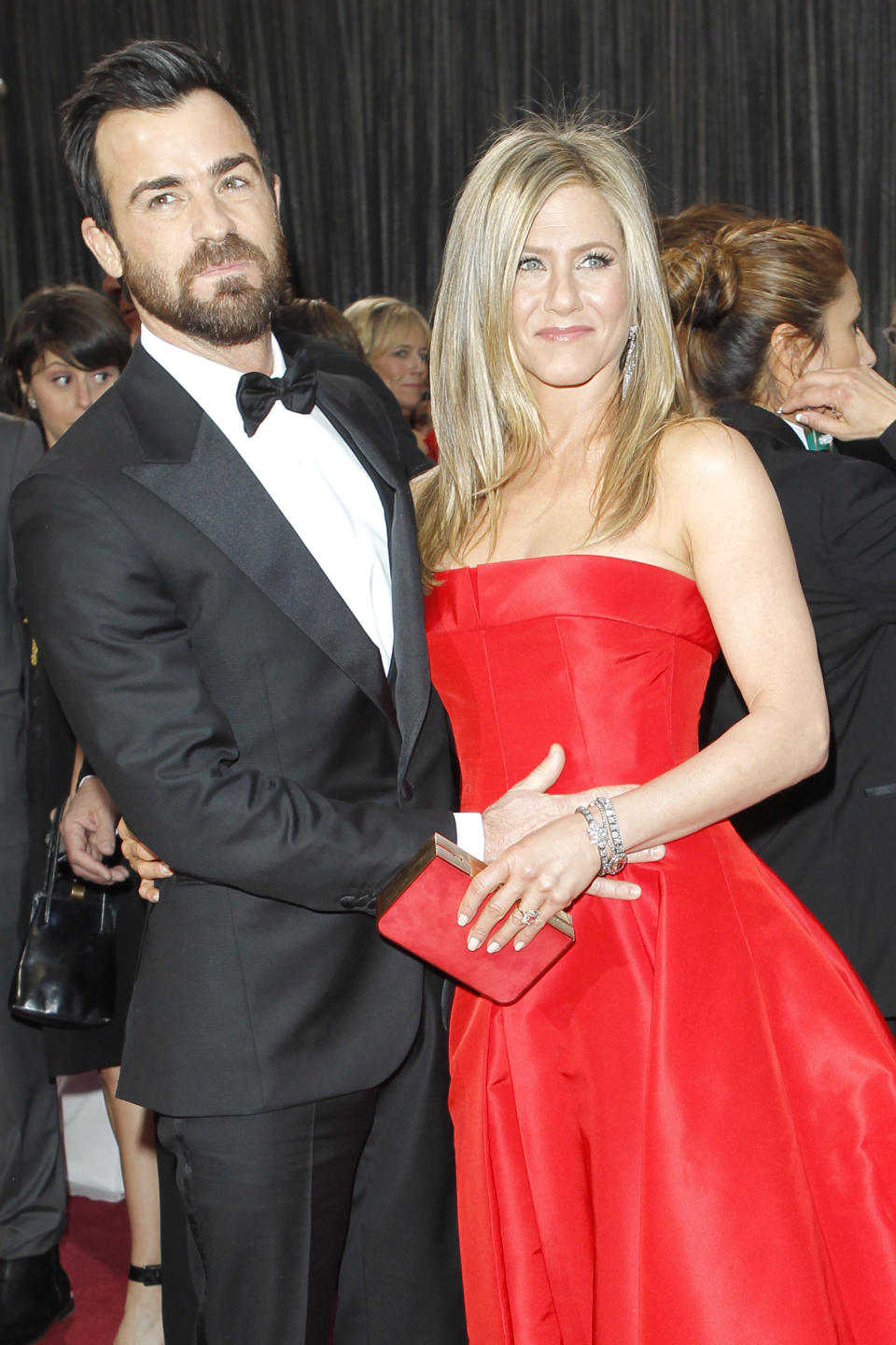 Justin Theroux (L) and Jennifer Aniston attend the 85th annual Academy Awards at the Dolby Theatre. Aniston wears Fred Leighton jewelry with a Salvatore Ferragamo clutch. Theroux wears a Salvatore Ferragamo suit. (Photo by Donato Sardella/WWD/Penske Media via Getty Images)