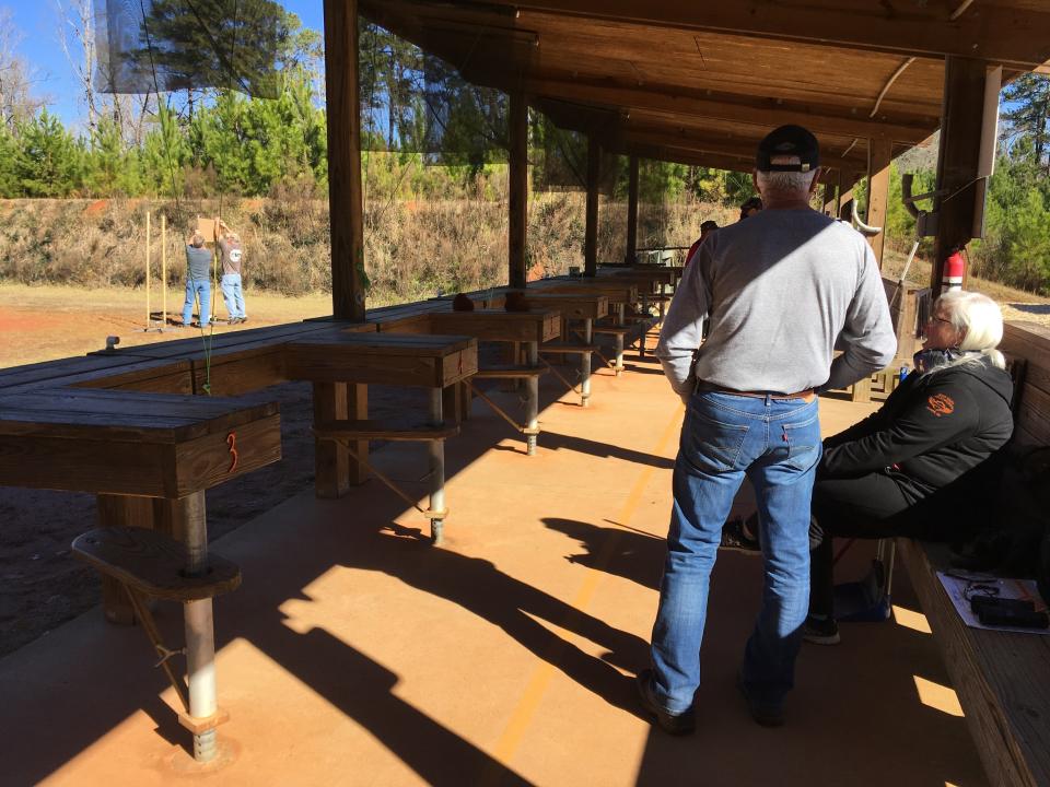 Some fellow shooters wait around while others set up their targets during a cease-fire at Cedar Creek, in January 2019. (Photo: Courtesy of Mel Plaut)
