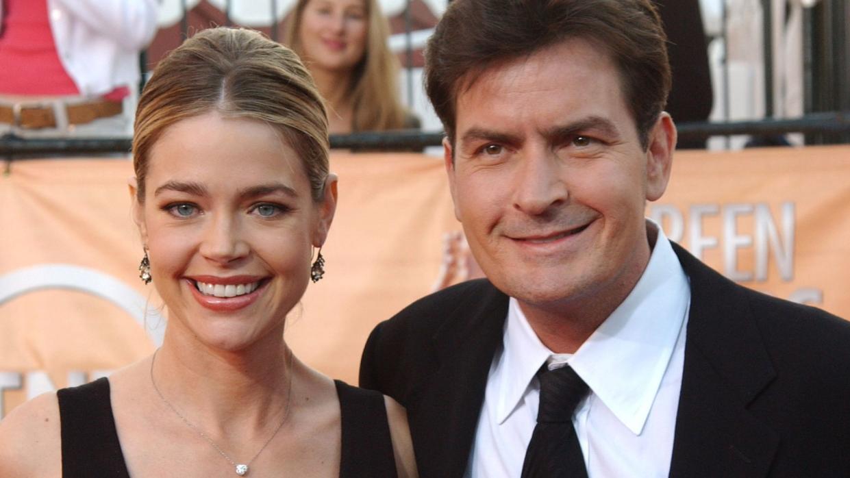 Denise Richards and Charlie Sheen during 2005 Screen Actors Guild Awards - Arrivals at The Shrine in Los Angeles, California, United States