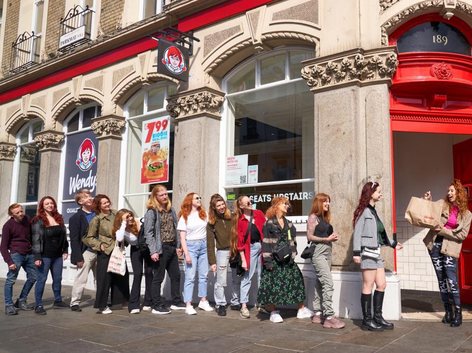 Photo of redheads in a queue outside a Wendy's store in Camden, London