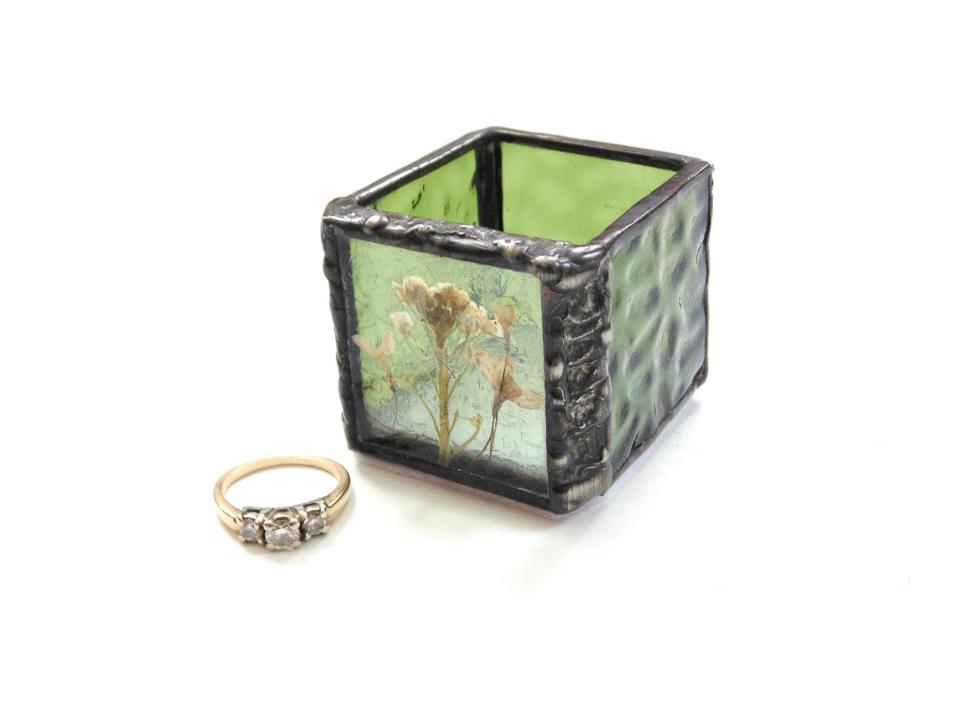 A stained glass jewelry box, decorated with pressed flowers, by Designs Stained Glass in Chepachet.