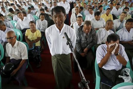 A farmer asks for a loan for his farm during a meeting with Shwe Mann (not in picture), speaker of Union Parliament and Lower House of Parliament, at Kanyutkwin, Pyu township, Bago division August 22, 2015. REUTERS/Soe Zeya Tun