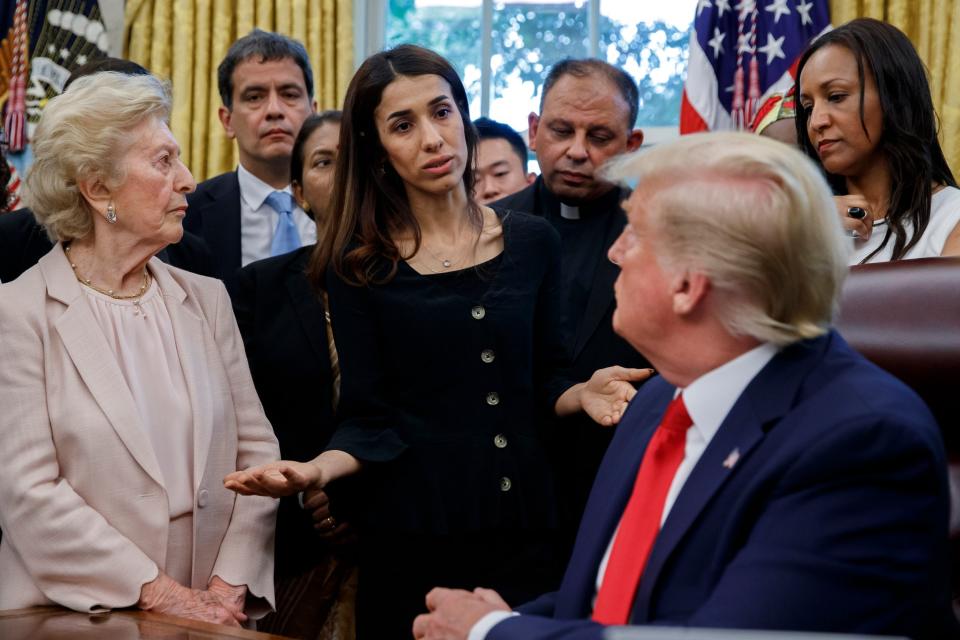 For years, Yazidi genocide survivor Nadia Murad has travelled the world to spread the word about the horrific crimes Isis committed against her people, and was awarded the Nobel Peace Prize for her efforts. But despite Donald Trump frequently claiming credit for defeating the terror group, he appeared unfamiliar with Ms Murad’s work when the two met at the White House on Wednesday. As Ms Murad finished telling Mr Trump the story of how her family was killed when Isis ran rampage across northern Iraq in 2014, and of her own abduction by the group, the president replied: “And you had the Nobel Prize? That's incredible. They gave it to you for what reason?”Ms Murad then asked Mr Trump to press Iraqi and Kurdish authorities to do more for the survivors of the Isis genocide, and to allow Yazidis to return home. "But Isis is gone and now it's Kurdish and who?" he responded.Mr Trump said that he would "look into it very strongly". The interaction took place at an Oval Office meeting between the president and a group of survivors of religious persecution, on the sidelines of a State Department conference on religious freedom. Also present was a representative of the Rohingya, a Muslim minority that has been the target of a state-orchestrated massacre in their home country of Myanmar.Thousands of Yazidis were killed and more than 6,000 women and children were taken captive by Isis in the summer of 2014, when the terror group carried out a murderous rampage against the small religious minority in their traditional homeland in northern Iraq. The UN would later declare the attack on Sinjar, and the ongoing enslavement of Yazidi women, a genocide. Many Yazidis are still living in displacement camps within Iraq, unable to return to their devastated towns and villages. Ms Murad was among the women who were taken into slavery by Isis, when she was 19 years old. She escaped after three months, and has spent her time since helping women and children who are victims of abuse and human trafficking. In 2018, she was jointly awarded the Nobel Prize, along with Congolese doctor Denis Mukwege, "for their efforts to end the use of sexual violence as a weapon of war and armed conflict.""My people cannot go back," she told the president in an impassioned plea. "After 2014, 95,000 Yazidis emigrated to Germany, not because we want to be refugees, but because we cannot find a safe place to live. I'm still fighting to live in safety.""Please do something. It's not about one family," she said.