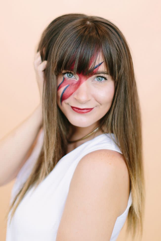 <p>This Halloween, channel your inner rock star, inspired by the one and only David Bowie. </p><p><strong>Get the tutorial at <a href="https://camillestyles.com/beauty-and-style/beauty-tutorials/diy-david-bowie-makeup-look/" rel="nofollow noopener" target="_blank" data-ylk="slk:Camille Styles;elm:context_link;itc:0;sec:content-canvas" class="link ">Camille Styles</a>.</strong> </p>