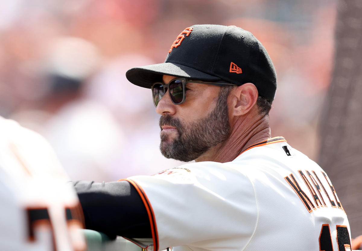 San Francisco Giants manager won't stand for anthem following mass