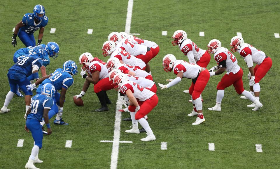 Will Knight lines up at quarterback in Smyrna's earthquake formation in the 2017 Division I state championship game against Middletown at Delaware Stadium. Smyrna won their third straight state title by relying heavily on earthquake in the game.