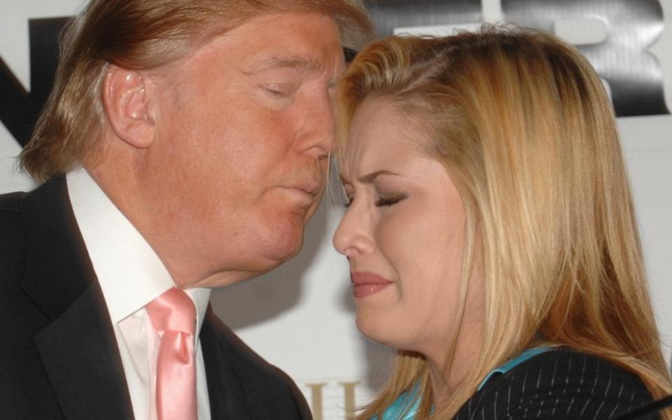 Trump embraces Miss USA winner Tara Conner - Credit: Brad Barket/Getty Images  