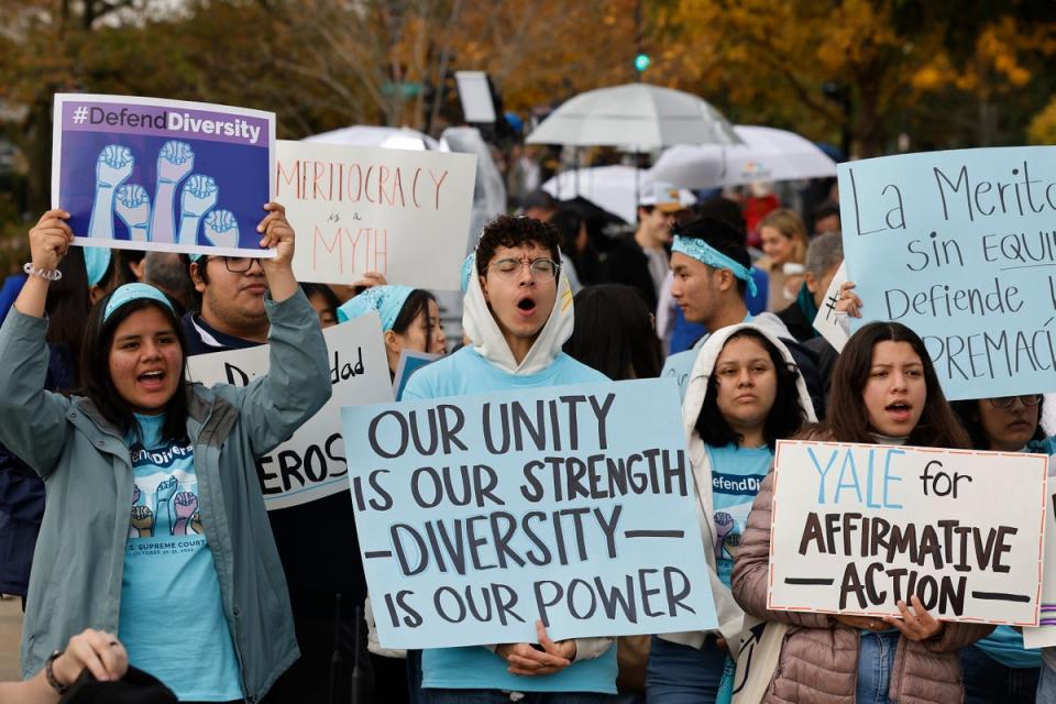 Demonstrators outside the US Supreme Court rallied in support of race-conscious university admissions policies on 31 October (Getty Images)