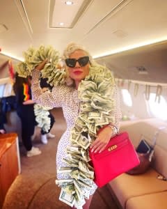‘Vegas Baby!' Lady Gaga Wears Boa Made of $100 Bills and Pink Hermès Birkin on Private Jet