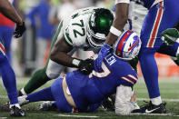 Buffalo Bills quarterback Josh Allen (17) is sacked by New York Jets defensive end Micheal Clemons (72) during the fourth quarter of an NFL football game, Monday, Sept. 11, 2023, in East Rutherford, N.J. (AP Photo/Adam Hunger)