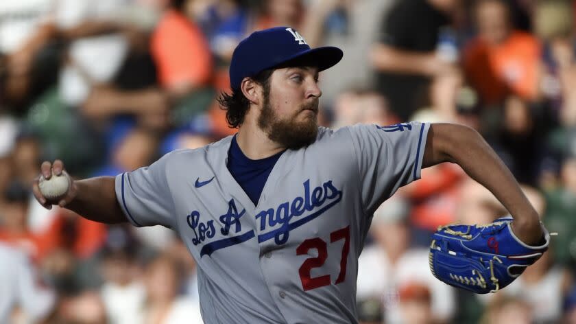 Los Angeles Dodgers starting pitcher Trevor Bauer delivers during the first inning of a baseball game against the Houston Astros, Wednesday, May 26, 2021, in Houston. (AP Photo/Eric Christian Smith)