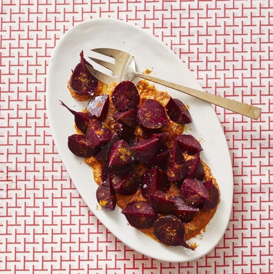 <p>This side dish is as visually appealing as it is colorful, with orange bell peppers and beets.</p><p><em>Get the <a href="https://www.womansday.com/food-recipes/food-drinks/a30416736/turmeric-roasted-beets-with-orange-bell-pepper-romesco-recipe/" rel="nofollow noopener" target="_blank" data-ylk="slk:Turmeric-Roasted Beets With Orange Bell Pepper Romesco recipe;elm:context_link;itc:0;sec:content-canvas" class="link ">Turmeric-Roasted Beets With Orange Bell Pepper Romesco recipe</a>.</em></p>