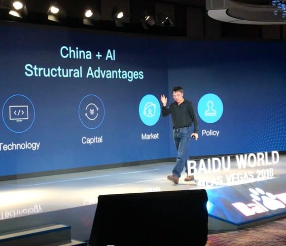 Baidu COO Qi Lu presenting on stage at CES 2018.