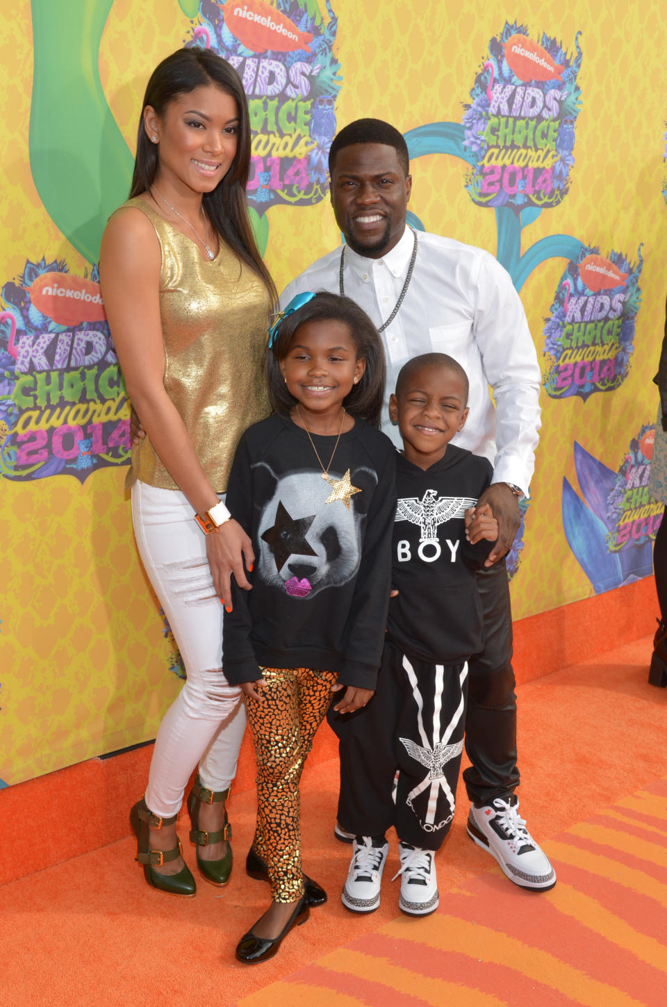 From left, Torrei Hart, Kevin Hart, Heaven Hart and Hendrix Hart arrive at the 27th annual Kids' Choice Awards at the Galen Center on Saturday, March 29, 2014, in Los Angeles. (Photo by John Shearer/Invision/AP)