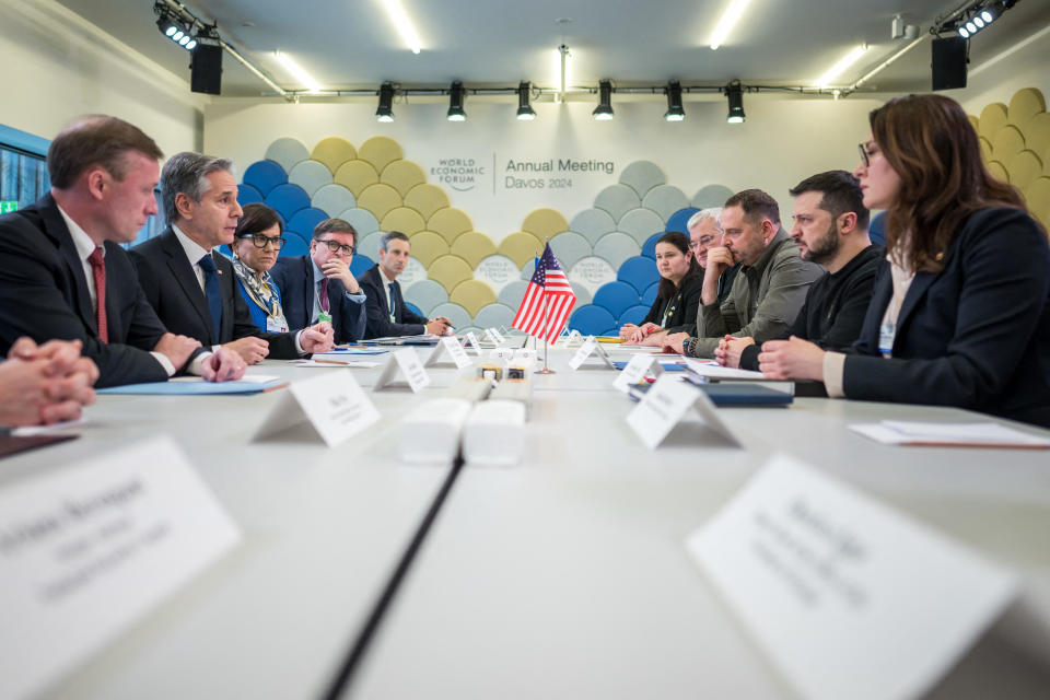 U.S. national security adviser Jake Sullivan, far left, and U.S. Secretary of State Antony Blinken, second from left, speak with Ukrainian President Volodymyr Zelenskyy, second from right, during a bilateral meeting at the annual meeting of the World Economic Forum in Davos, Switzerland, Jan. 16, 2024. / Credit: Fabrice Coffrini/AFP via Getty Images