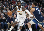 Denver Nuggets forward Jeff Green drives past Minnesota Timberwolves guard Wendell Moore Jr. during the second half of an NBA basketball game Tuesday, Feb. 7, 2023, in Denver. (AP Photo/David Zalubowski)