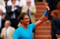 Spain's Rafael Nadal celebrates after winning his first round match; Roland Garros, Paris, France - 26/5/15, Reuters / Jason Cairnduff