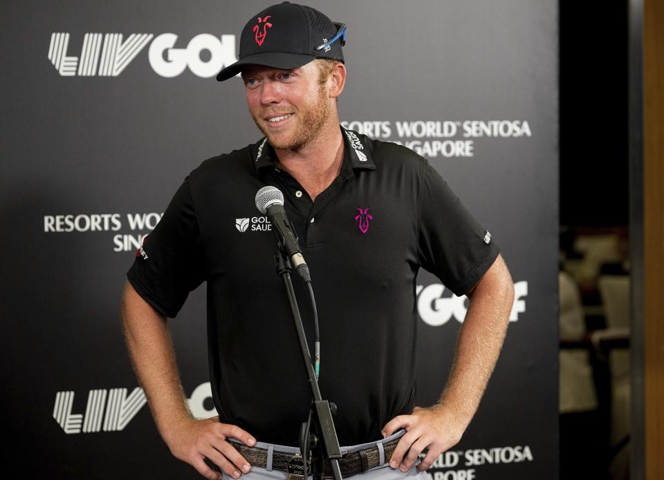 First place Individual and team champion Talor Gooch of RangeGoats GC speaks at a news conference after the final round of LIV Golf Singapore at the Sentosa Golf Club on Sentosa Island in Singapore on Sunday, April 30, 2023. (Scott Taetsch/LIV Golf via AP)