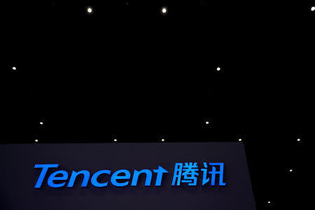 FILE PHOTO: A Tencent sign is seen during the fourth World Internet Conference in Wuzhen, Zhejiang province, China, Dec. 4, 2017. REUTERS/Aly Song